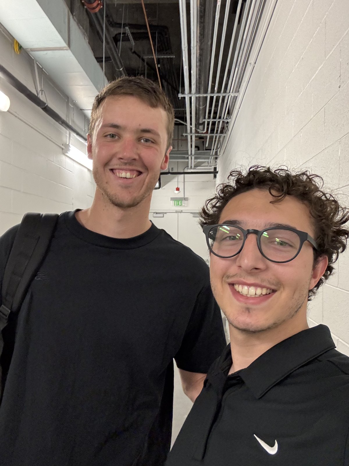 Aden Arbeli with Milwaukee Brewers pitcher Jacob Misiorowski in the clubhouse at Las Vegas Ballpark
