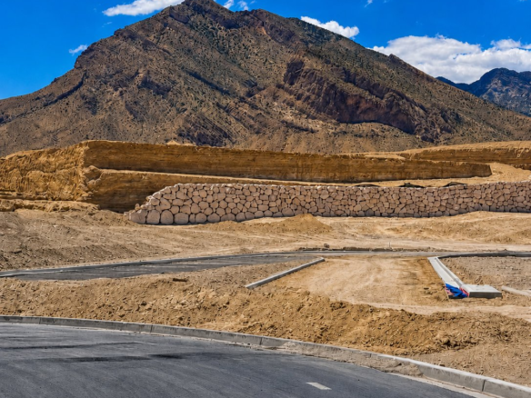 New construction grading at the base of the mountains in Summerlin West, Las Vegas, where relocating buyers research how Clark County property taxes are calculated at purchase