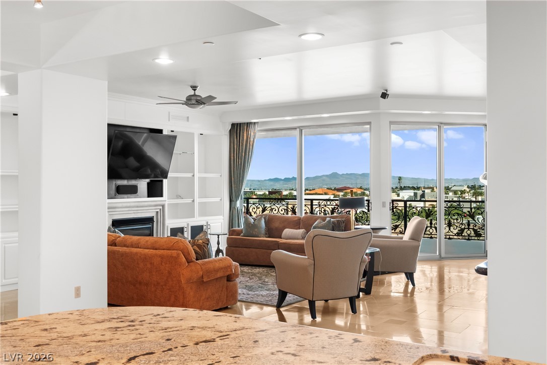 Open-concept living area with Red Rock views at One Queensridge Place Residence 305