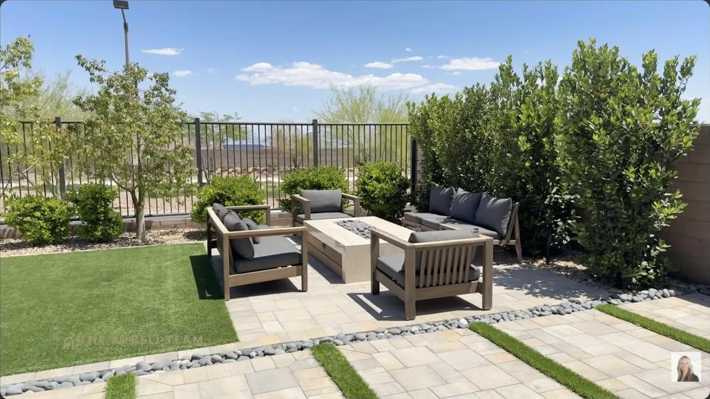 Backyard fire pit lounge with a view over the valley at a new-construction home in Kestrel Village Summerlin