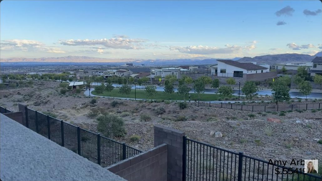 Elevated backyard view over the neighborhood and mountains from a modern Summerlin home in Redpoint