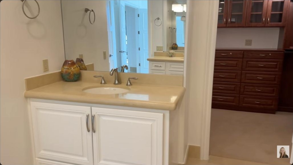 Primary suite spa bath and walk-in closet in the One Queenridge high rise in Summerlin