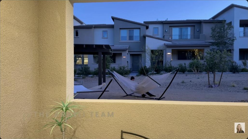 Private balcony with a hammock overlooking the community at a Summerlin townhome in Reverence
