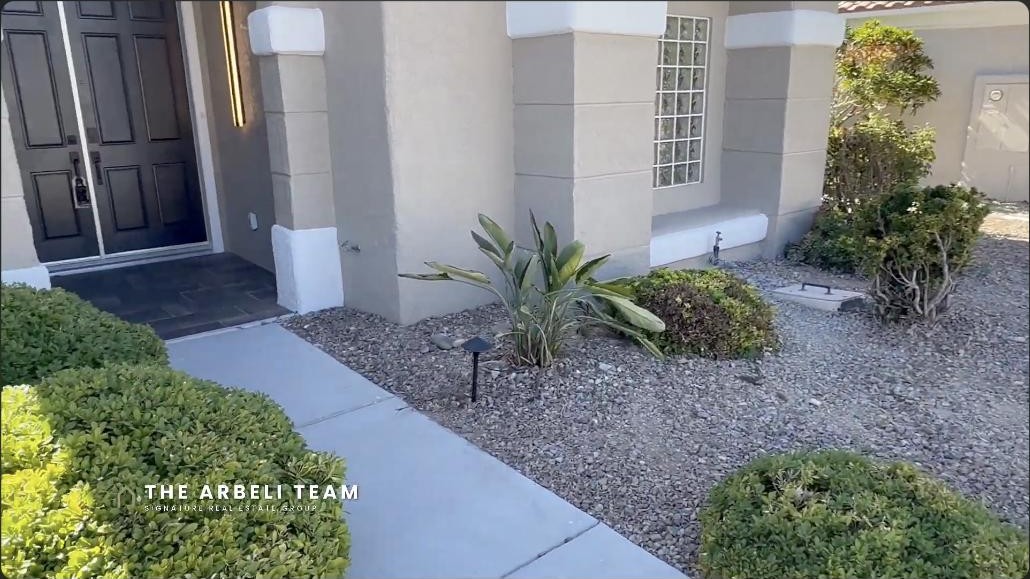Front entry and double doors of a renovated Sun City Summerlin single story home