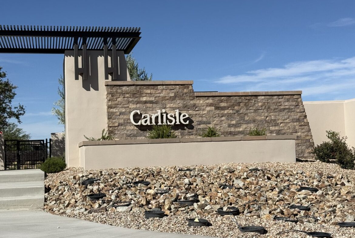 Shared entrance monument reading Carlisle at the gated Tri Pointe Homes community serving Carlisle Peak and Carlisle Ridge in the Grand Park village of Summerlin West, Las Vegas, Nevada 89138