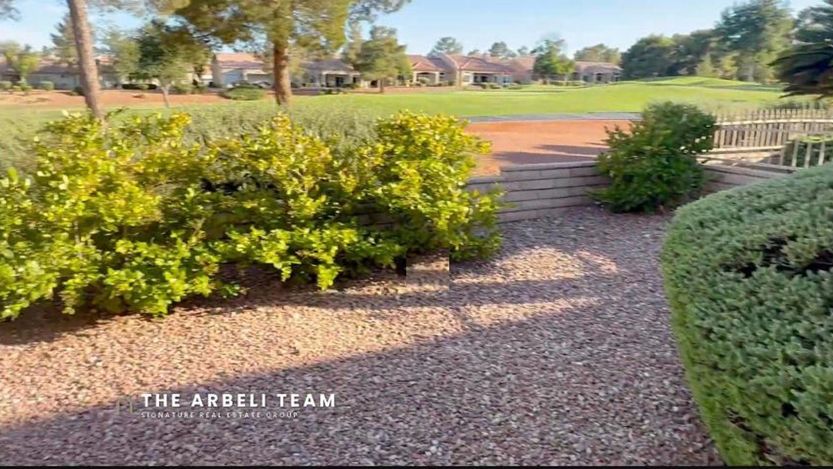 Backyard patio overlooking the golf course at a remodeled Sun City Summerlin home in Las Vegas