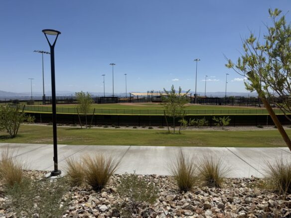 Open lawn and lighted pathway at Grand Park in Summerlin West, Las Vegas, Nevada