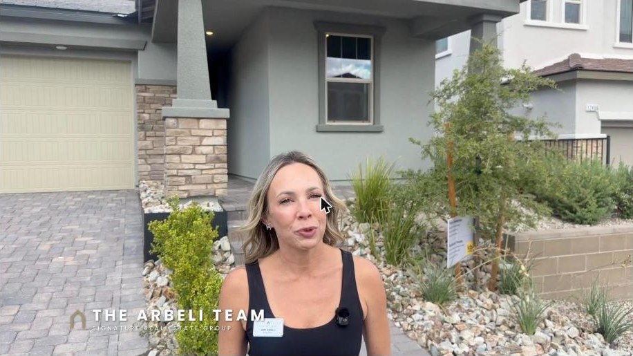 Amy Arbeli at the front entry during the Grand Park Summerlin Las Vegas home tour