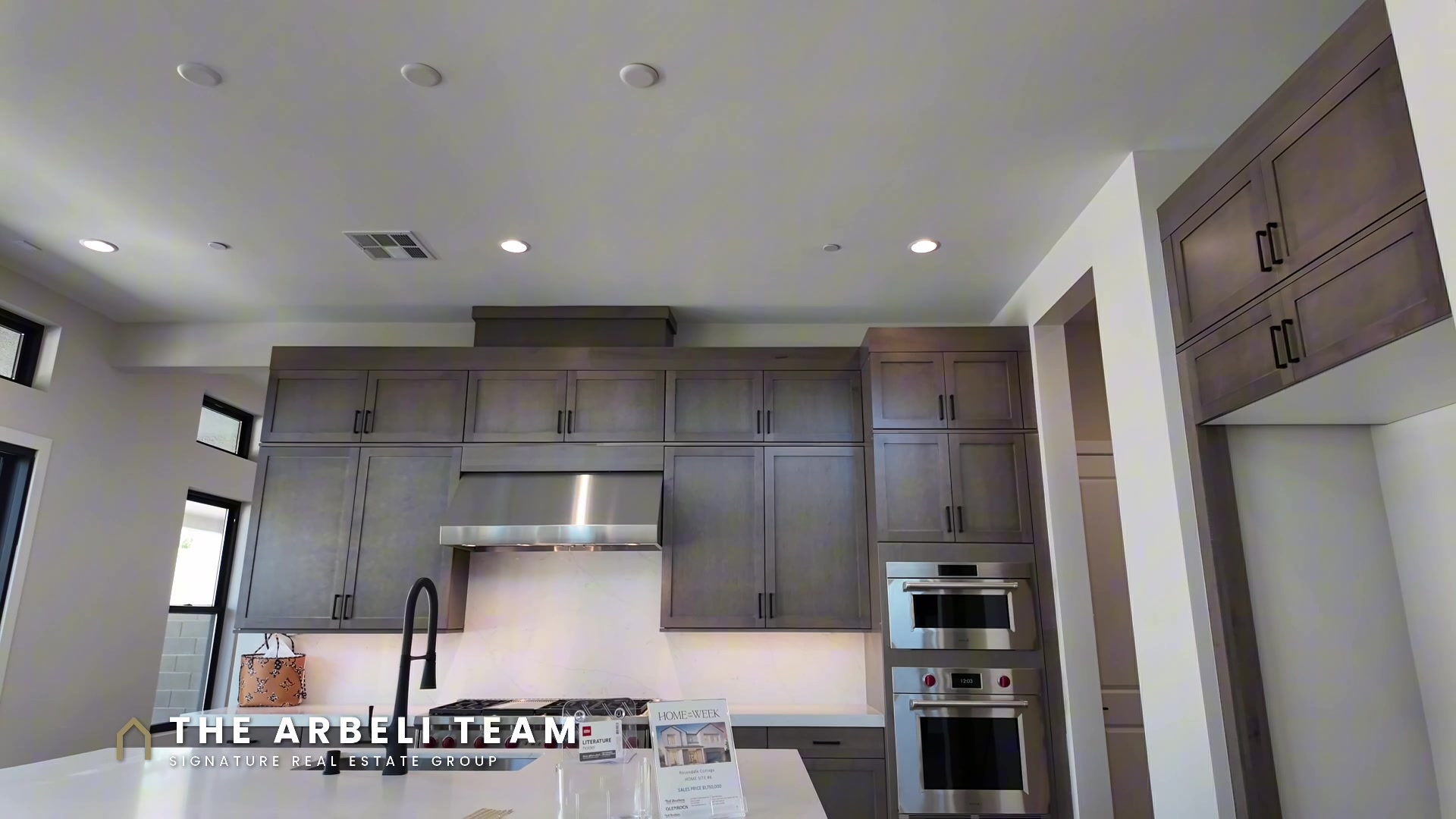 Gourmet kitchen with Wolf appliances and island in a Toll Brothers Glenrock home in Summerlin West