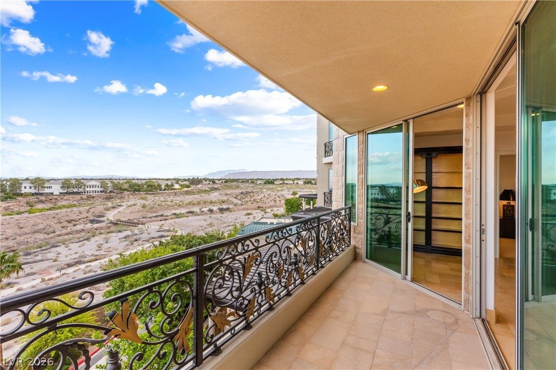 View of the Las Vegas valley from a private balcony at One Queensridge Place residence 305, Summerlin