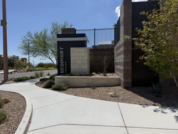 Stone entrance monument reading Redpoint at the village entrance in Summerlin West, Las Vegas, Nevada