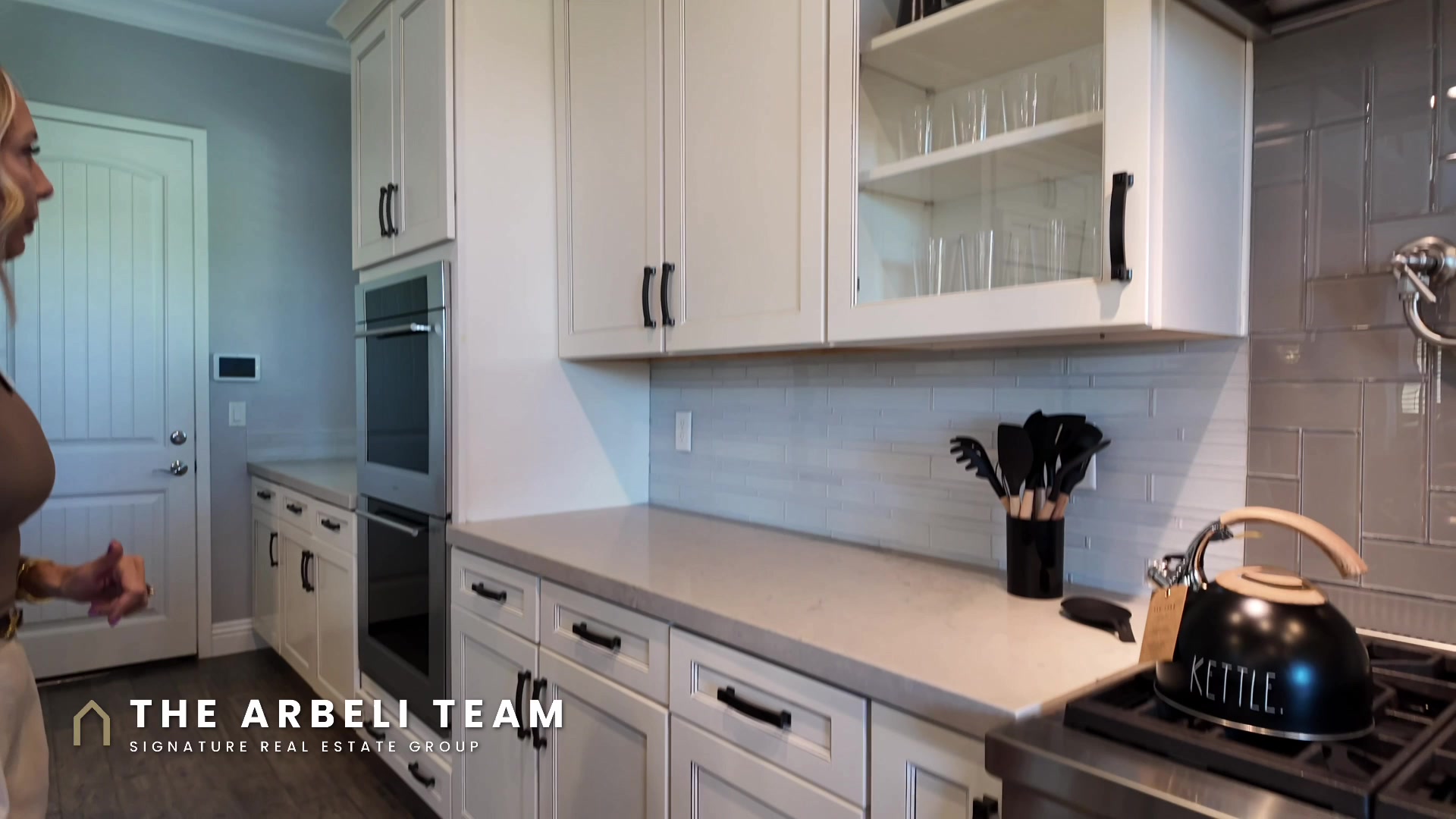 Chef kitchen with Wolf cooktop and Sub-Zero refrigerator in a Summerlin West luxury home