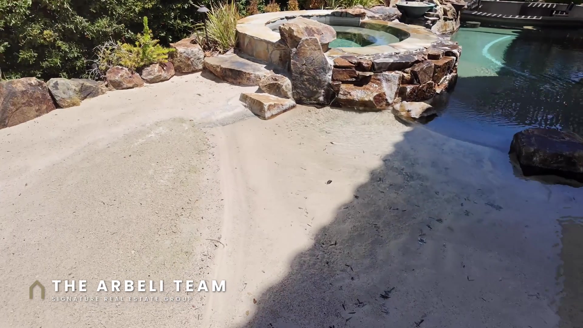 Sand beach entry pool at a Summerlin West luxury home tour in Las Vegas