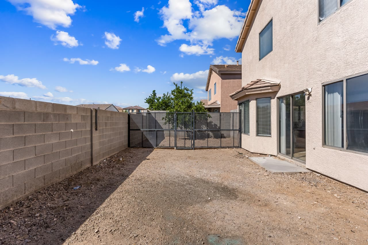 South-facing block-wall backyard, unfinished and ready to design, at 4655 Gracemont Avenue, Las Vegas 89139