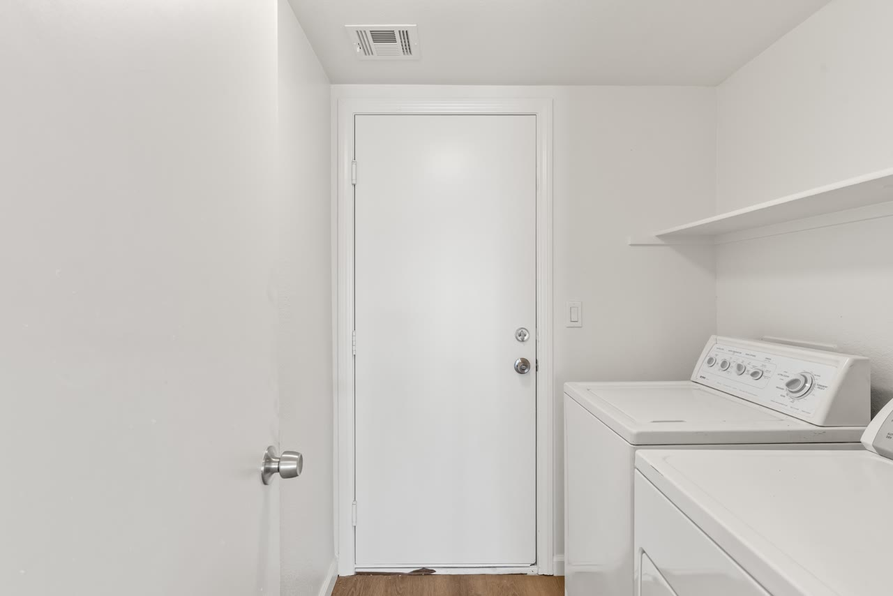 Main-floor laundry room at 4655 Gracemont Avenue, southwest Las Vegas four bedroom home