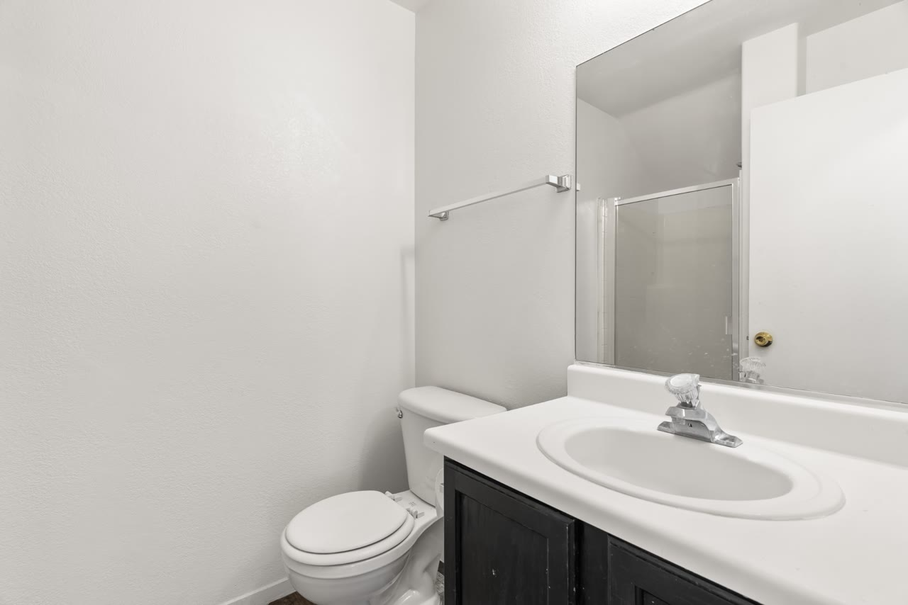 Main-floor three-quarter bath with a walk-in shower at 4655 Gracemont Avenue, Las Vegas 89139
