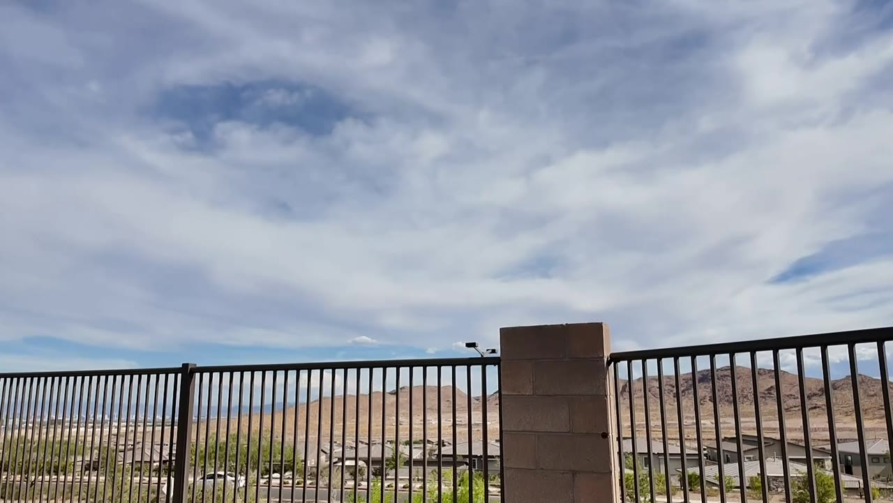The view from the front patio at 924 Kings Cliff Lane, mountains and the Las Vegas valley from a 55+ home in Summerlin West