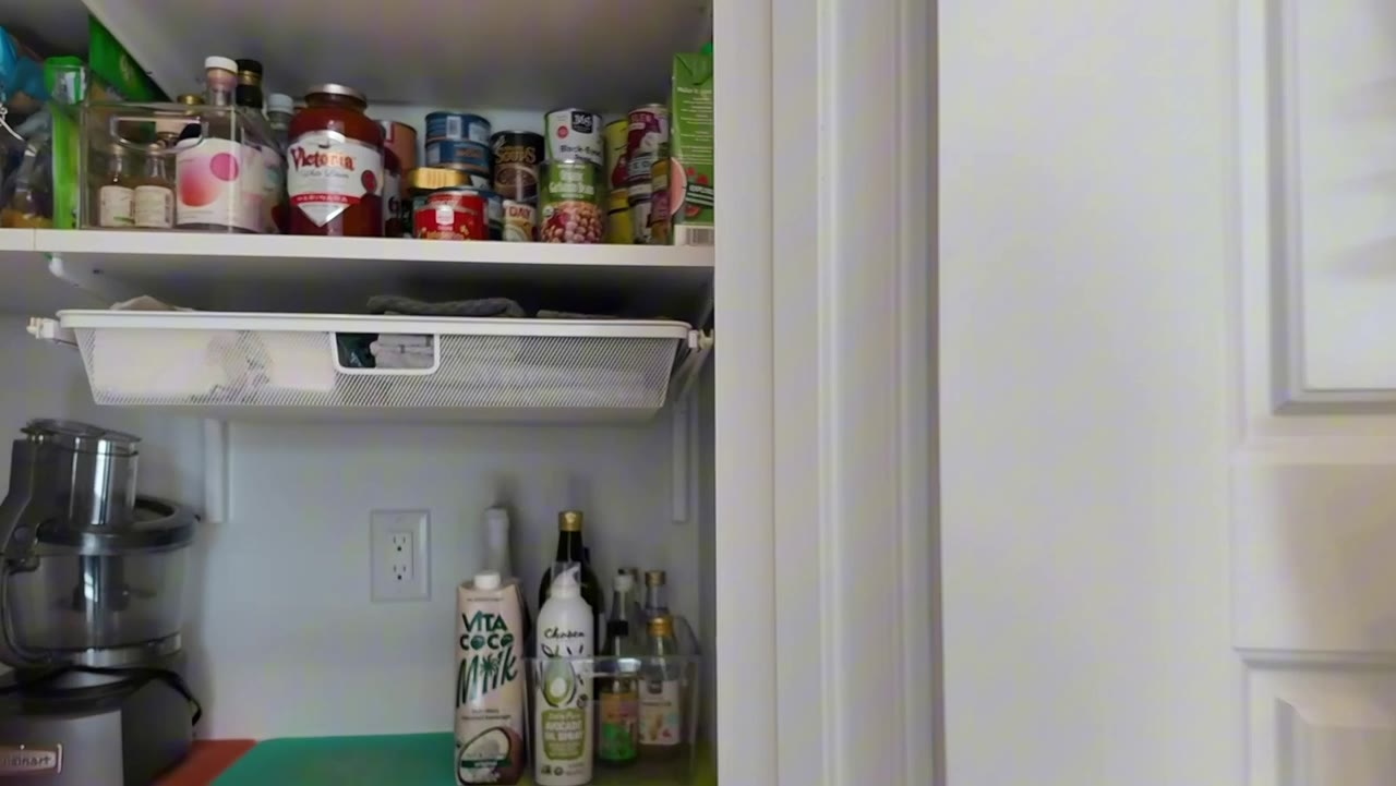 Walk-in pantry with owner-added cabinets, counters and electrical at 924 Kings Cliff Lane, Heritage at Stonebridge