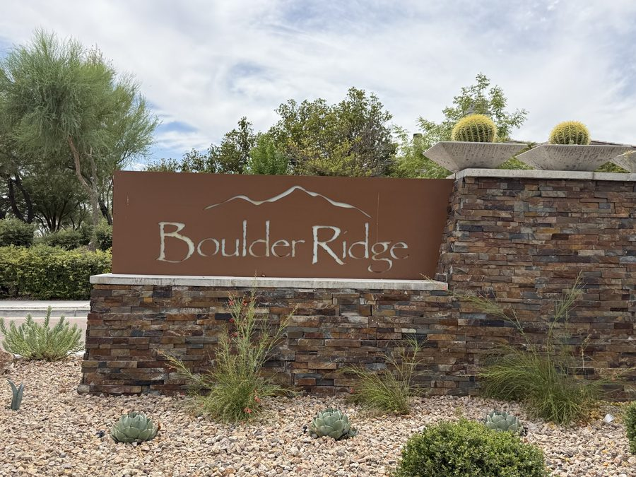 Stone entry monument reading Boulder Ridge at the gated entrance to the Boulder Ridge enclave inside The Ridges in Summerlin, Las Vegas, Nevada