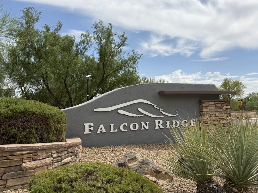 Stone entry monument reading Falcon Ridge at the gated entrance to the Falcon Ridge enclave inside The Ridges in Summerlin, Las Vegas, Nevada