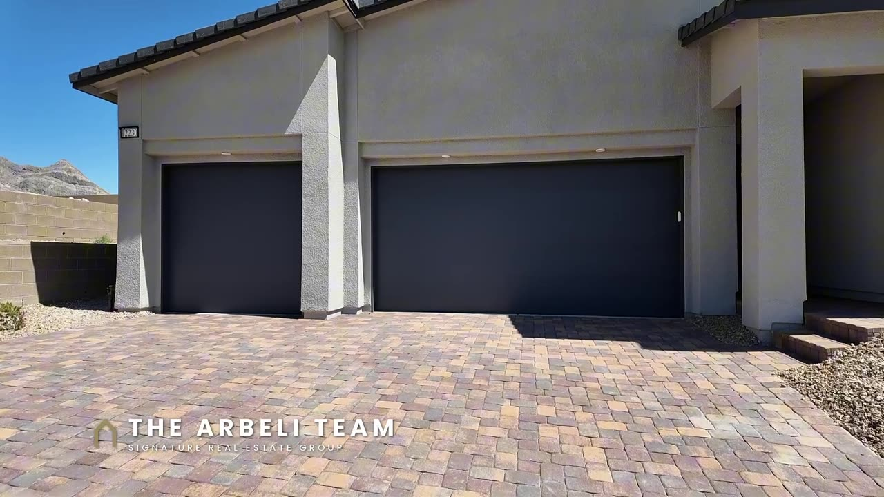 Three-car garage, three wide, on the Colonial at Ashland at Summerlin, a new construction home in Grand Park
