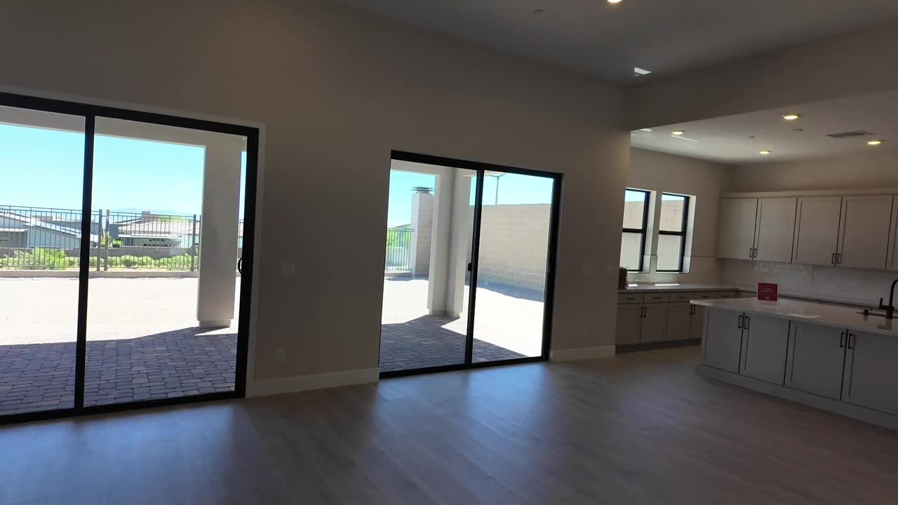 Great room with the 12-foot slider and view fencing in the new construction Summerlin home with the $249,000 price cut