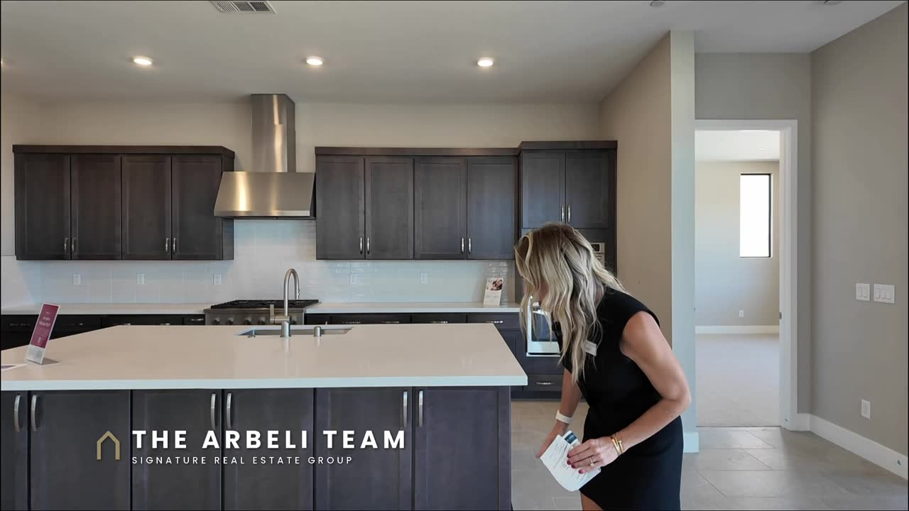 Oversized kitchen island in the Colonial at Ashland at Summerlin, new construction Summerlin with GE Cafe appliances