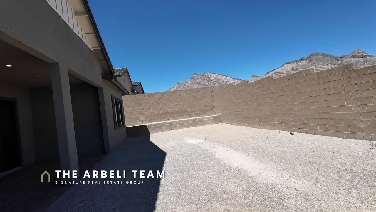 Backyard with mountain views and block walls at the Frontier, a new construction home in Ashland at Summerlin