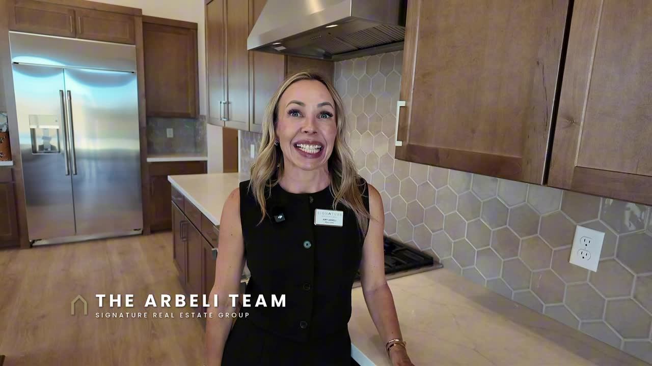 GE Cafe appliances and patterned backsplash in the Frontier kitchen, a new construction home in Summerlin West