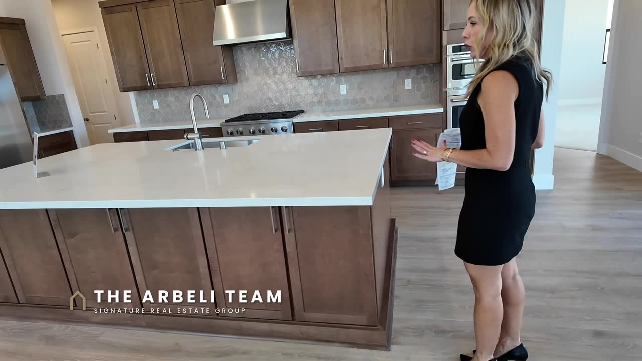 Kitchen island with seating for four to five stools in the Frontier at Ashland at Summerlin, new construction Summerlin