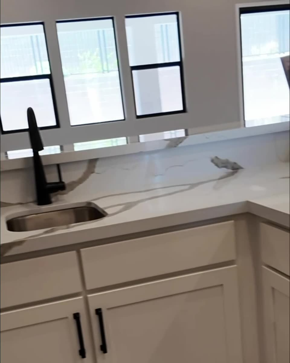 Wet bar cabinets and beverage fridge cutout in the Liberty, a new construction home in Grand Park, Summerlin West