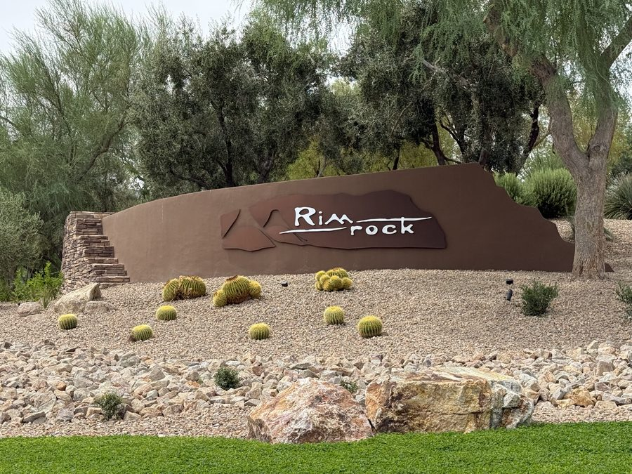 Stone entry monument reading Rim Rock at the gated entrance to the Rim Rock enclave inside The Ridges in Summerlin, Las Vegas, Nevada
