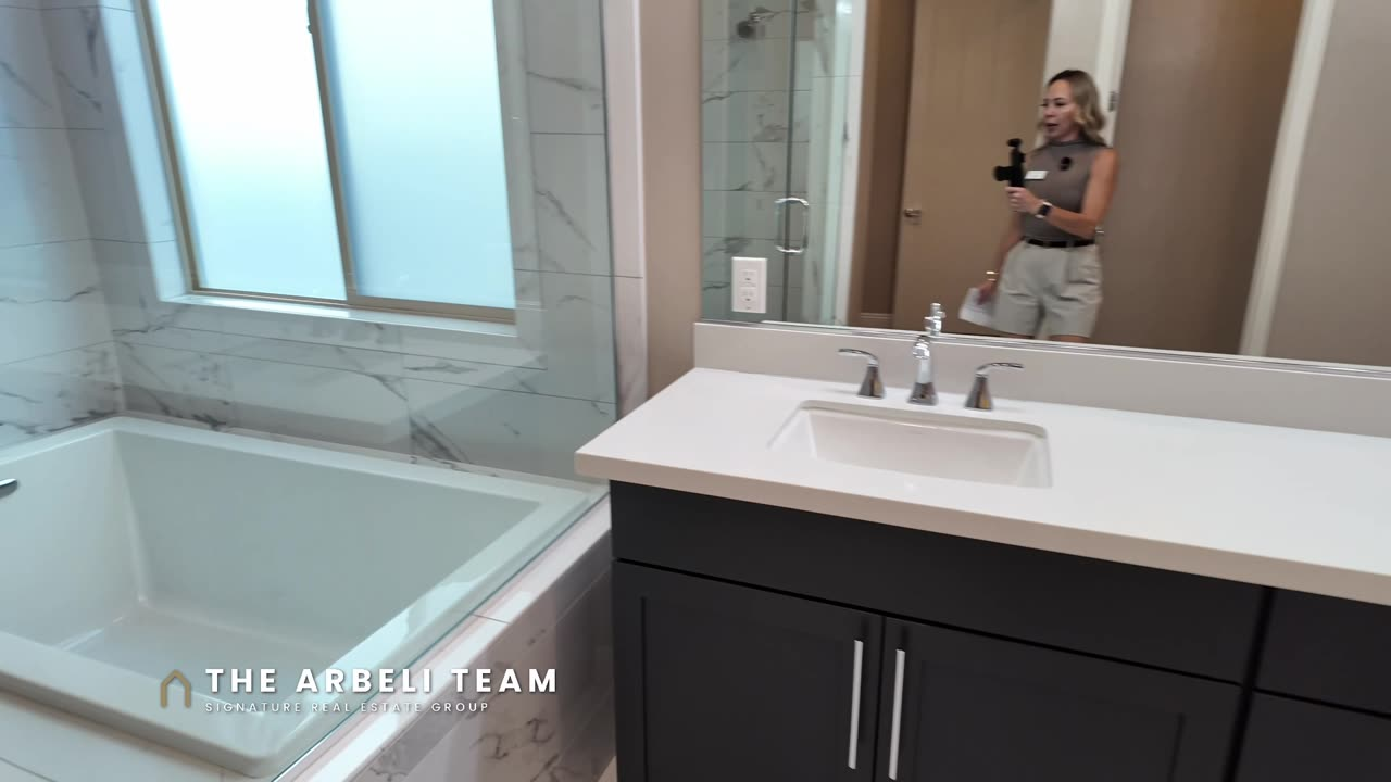 Main floor primary suite with spa bath in a Paseos Summerlin home tour