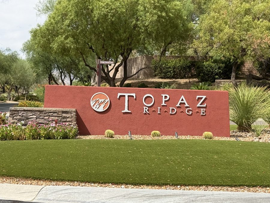 Stone entry monument reading Topaz Ridge at the gated entrance to the Topaz Ridge enclave inside The Ridges in Summerlin, Las Vegas, Nevada