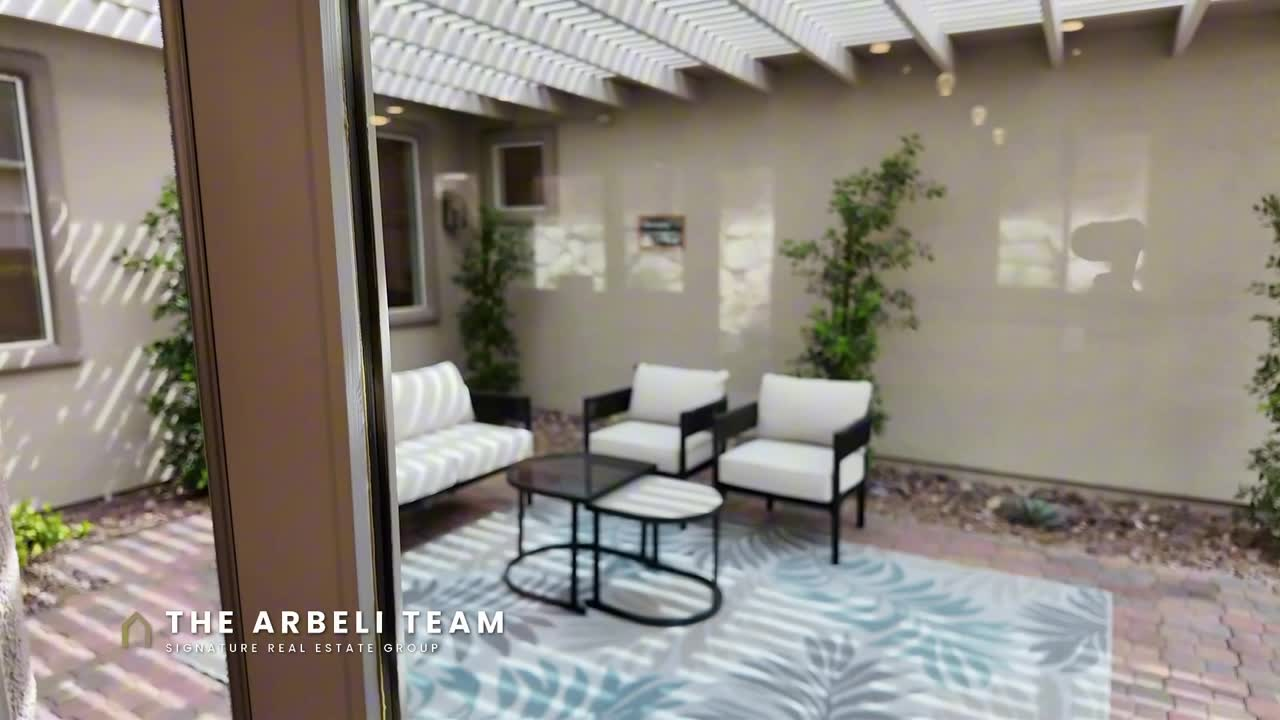 Private front courtyard entry at a renovated single story home in Encanto Summerlin West
