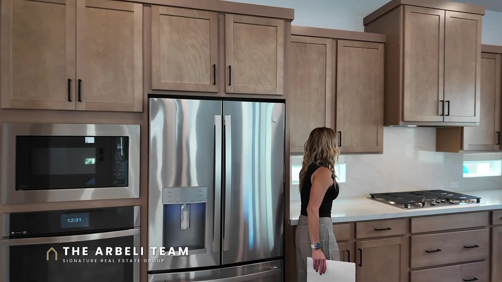 GE French door refrigerator, microwave and GE Profile oven in the kitchen of a Tri Pointe Plan 3 at Aberdeen, Summerlin West 89138